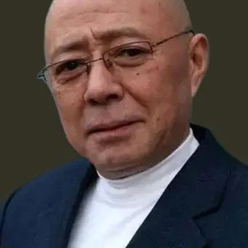 Ши Сяомань
